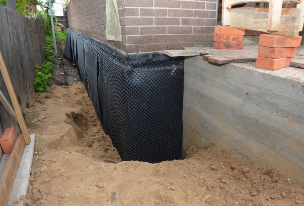 Happy homeowners after waterproofing job in Cumberland Furnace